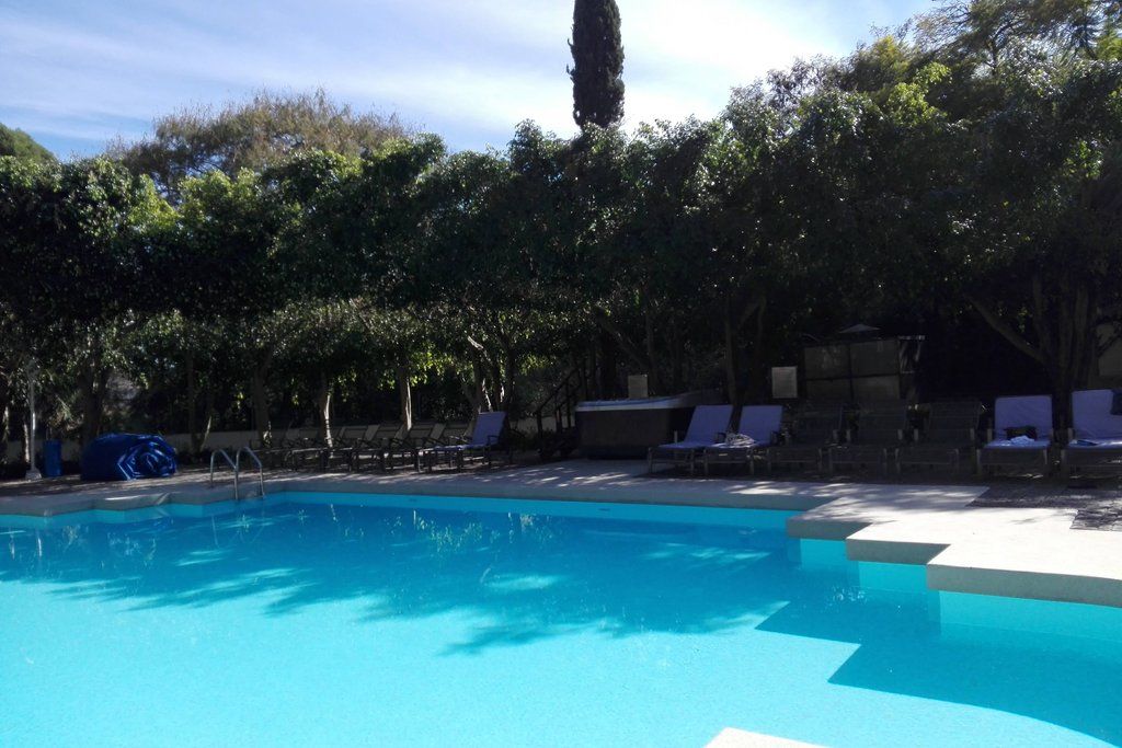 Fiesta Americana Hacienda Истапан де ла Сал Екстериор снимка The swimming pool at the hotel